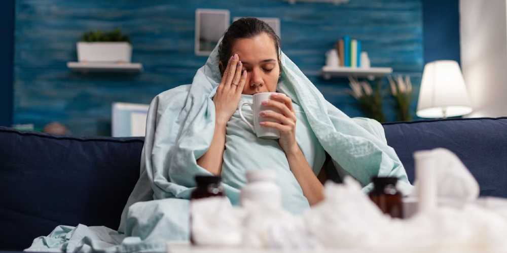 Woman Drinking treatment for flue
