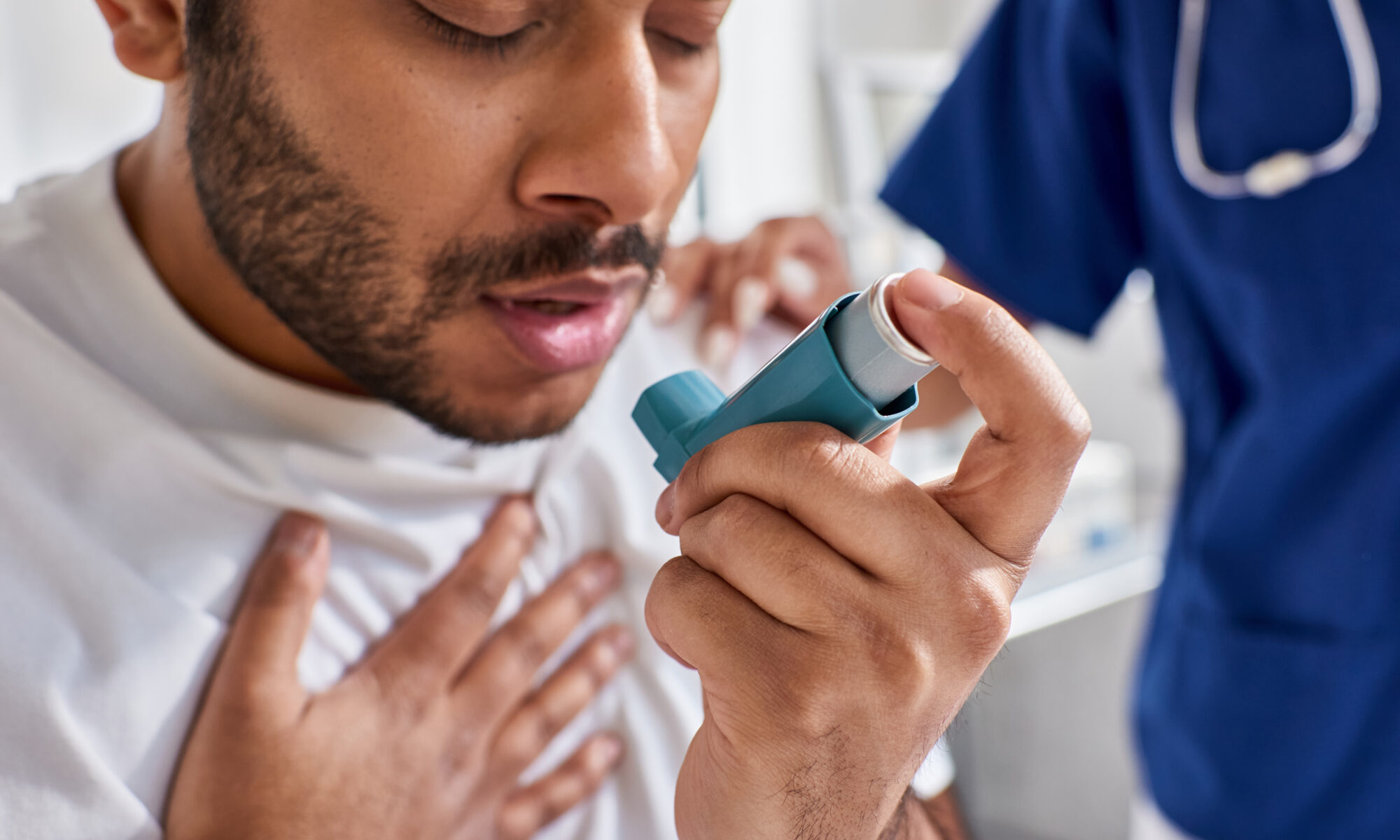 Man getting inhaler from best asthma doctor in ct.