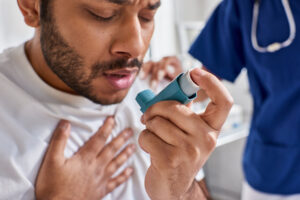 Man getting inhaler from best asthma doctor in ct.